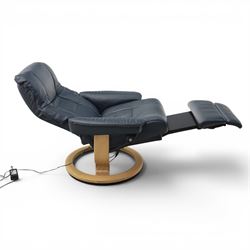 Ekornes - Stressless 'Mayfair, Classic Power' motorised swivel recliner armchair, size medium, upholstered in blue leather, raised on an oak finish frame