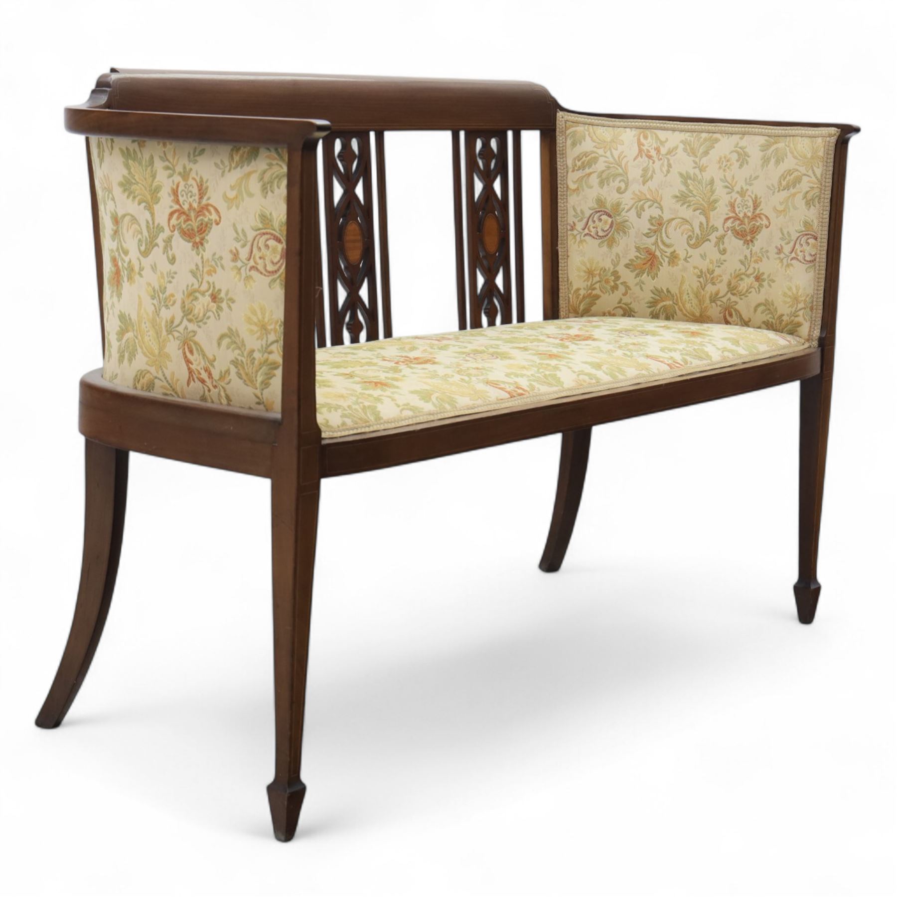 Edwardian mahogany boudoir suite couch, the couch back with three openwork splats inset with oval satinwood panels, the inlaid top rail extending to upholstered outswept ends, raised upon square tapering legs terminating in spade feet