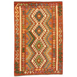 Anatolian Turkish Kilim amber ground rug, the field decorated with four lozenges with ivory outline, the double banded orange border with repeating geometric patterns 