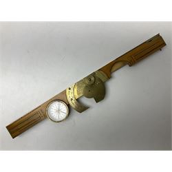Late 19th/early 20th century boxwood and brass clinometer rule by Stanley, with inset magnetic compass, screw action protractor hinge divided to one degree with rise in inches per yard scale under, spirit level to one edge, marked 'W.F. Stanley Great Turnstile Holborn' with tables of distances, angles and thickness H16cm closed: in original leather covered case with instructions