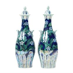 Pair of Keeling & Co Losol  ware lustre vases and covers of square spreading form decorated with flowers H33cm, a matching baluster vase and a lustre jar and cover decorated with landscape panels