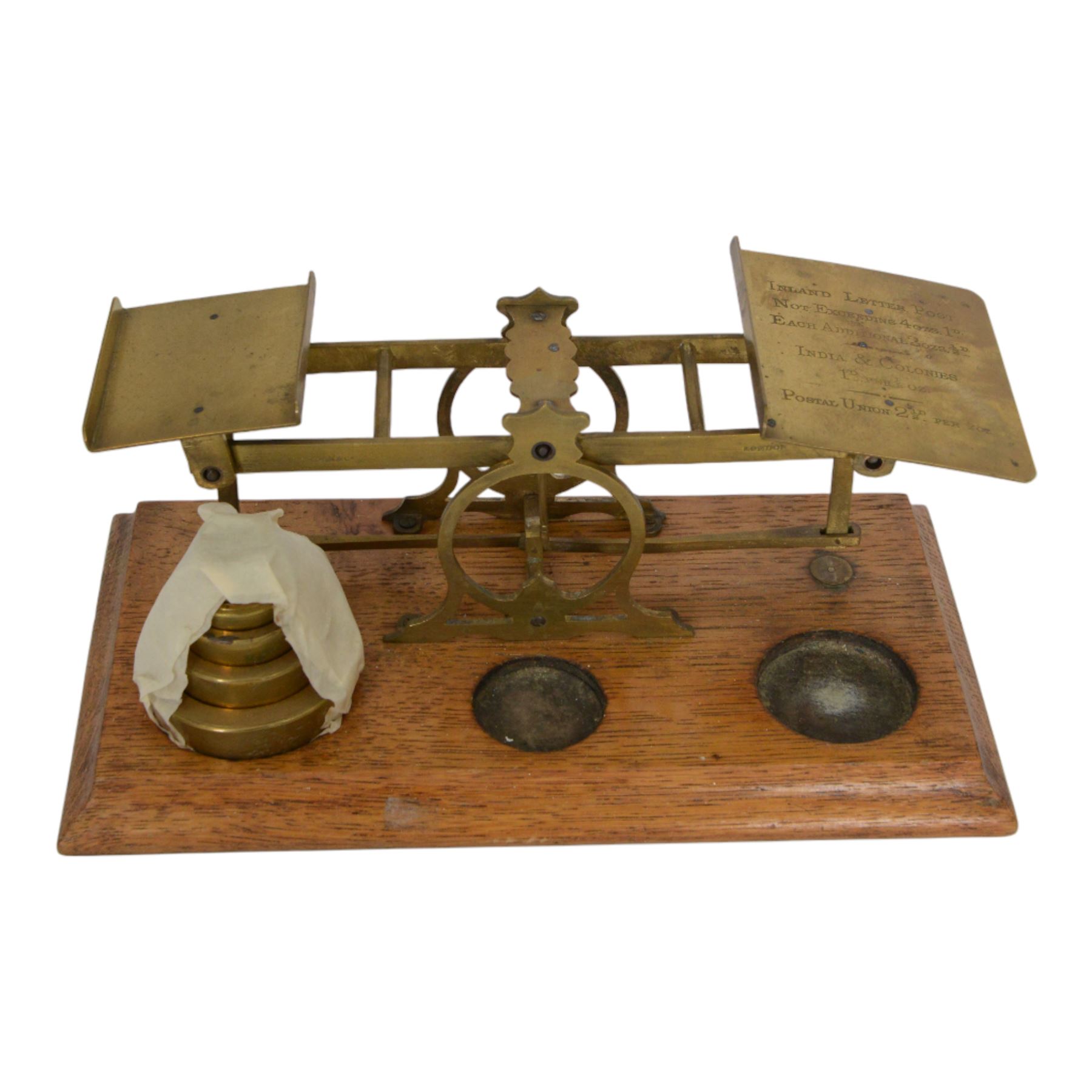 Cheroot holder with 9ct gold collar, silver cheroot holder, two cigar /cigarette cutters, two Victorian copper dishes set with Victorian penny, Otis King calculator and brassware, including folk art box, set of postage scales and Royal commemorative Prince Albert tobacco jar, match holder, etc