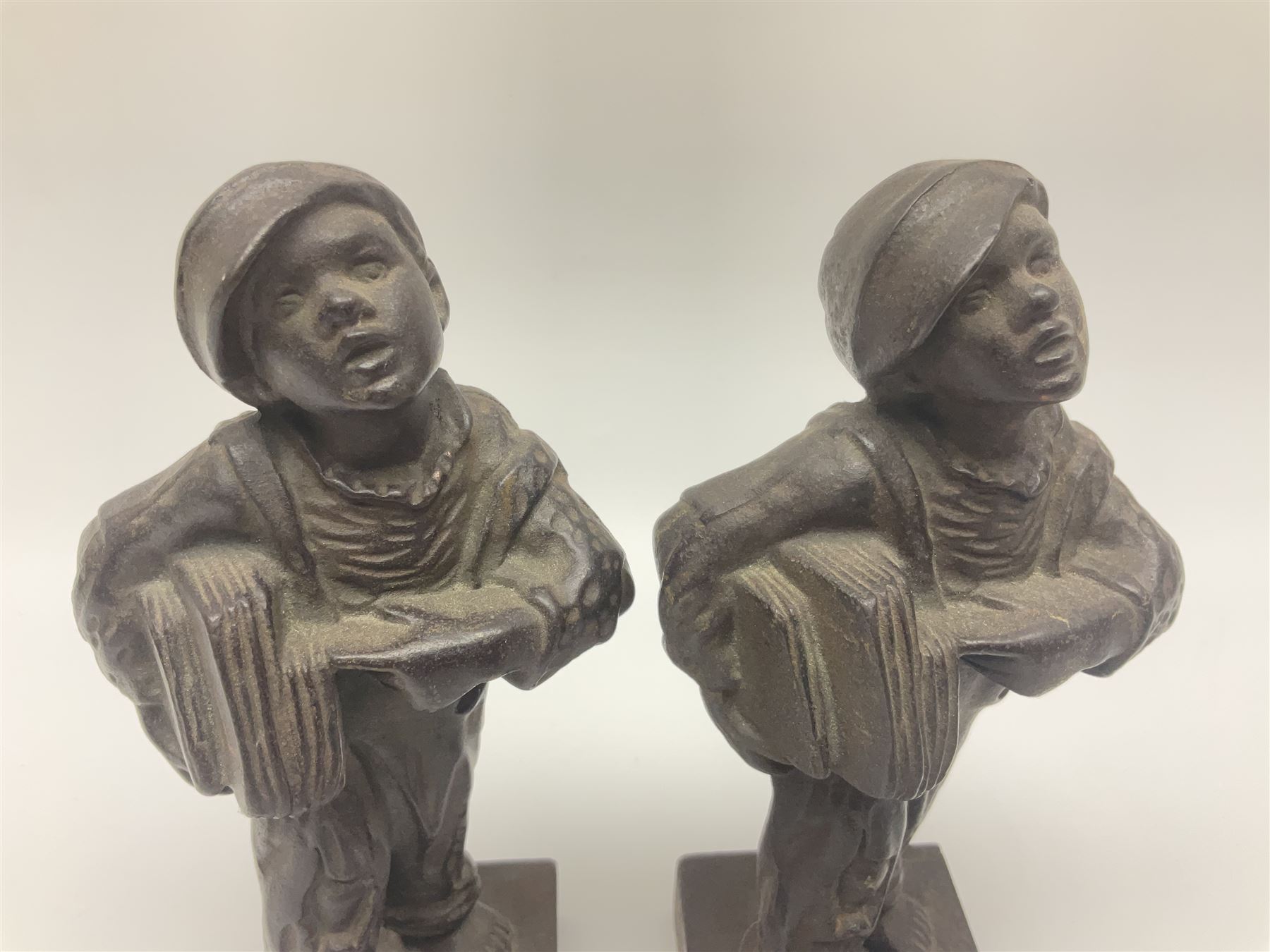 Pair of cast iron Qualcast advertising figures of news boys marked 'Speshul',  H18cm