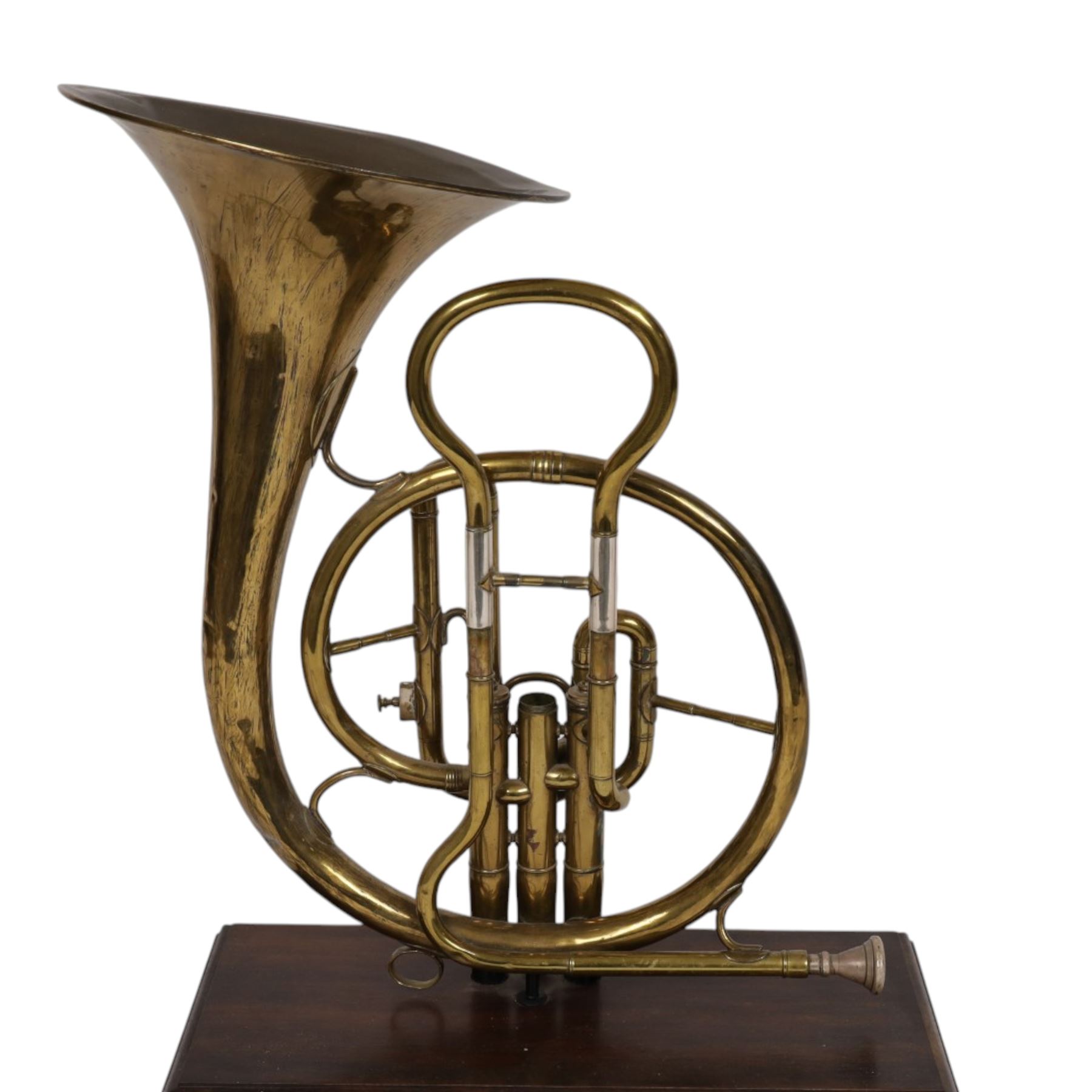 Boosey & Co Ltd French horn, converted into a table lamp, upon a wooden plinth, H45cm