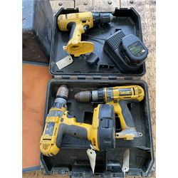 Three DeWalt battery drills, two heat guns and four DeWalt cases  - THIS LOT IS TO BE COLLECTED BY APPOINTMENT FROM DUGGLEBY STORAGE, GREAT HILL, EASTFIELD, SCARBOROUGH, YO11 3TX