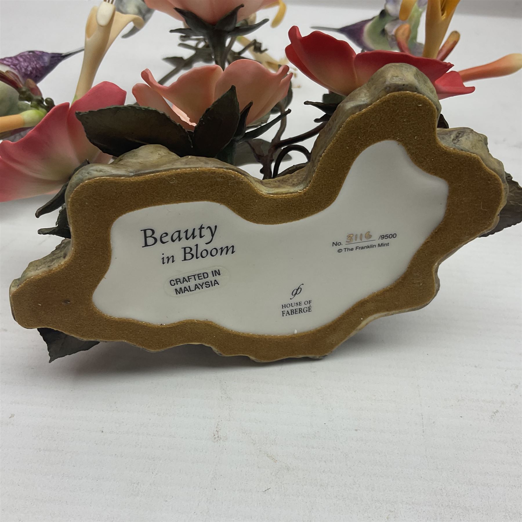 Franklin Mint House of Faberge, four humming bird figure groups, comprising Flight of Fancy, Beauty in Bloom, Splendor in the garden and The Enriched Garden, largest H35cm