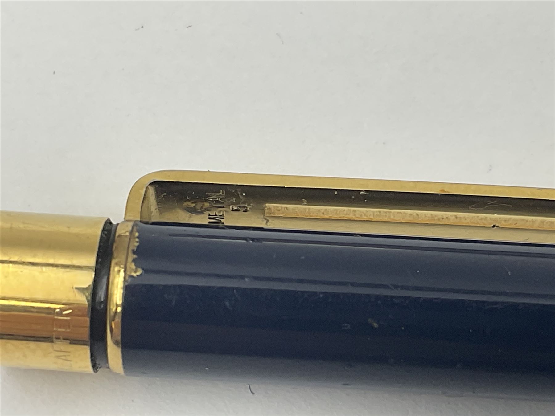 Sheaffer Targa 1011 Diamond Square fountain pen, the gold plated barrel with nib stamped 14K 585, together with another Sheaffer Targa fountain pen with blue barrel and gold nib stamped 14K 585 and matching ballpoint, and Sheaffer ballpoint pen with sterling silver barrel, largest L13.5cm (4)