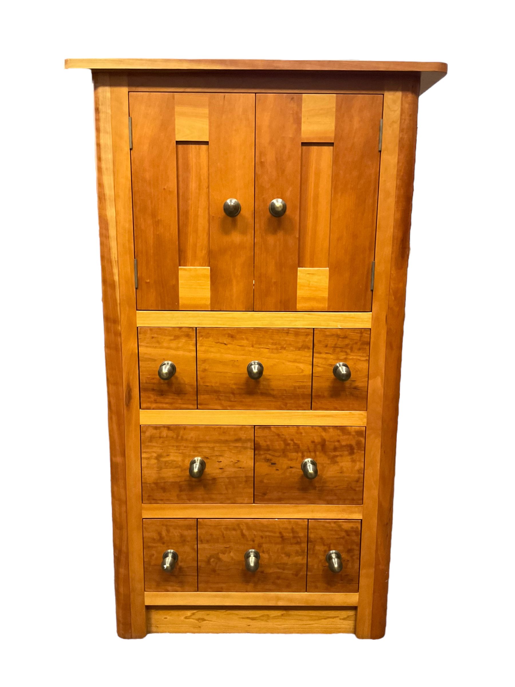 Cherry wood cabinet, fitted with double cupboard over two short and two long drawers, with faux drawer facias