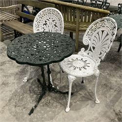 Cast aluminium green painter garden table and white painted chairs  - THIS LOT IS TO BE COLLECTED BY APPOINTMENT FROM DUGGLEBY STORAGE, GREAT HILL, EASTFIELD, SCARBOROUGH, YO11 3TX