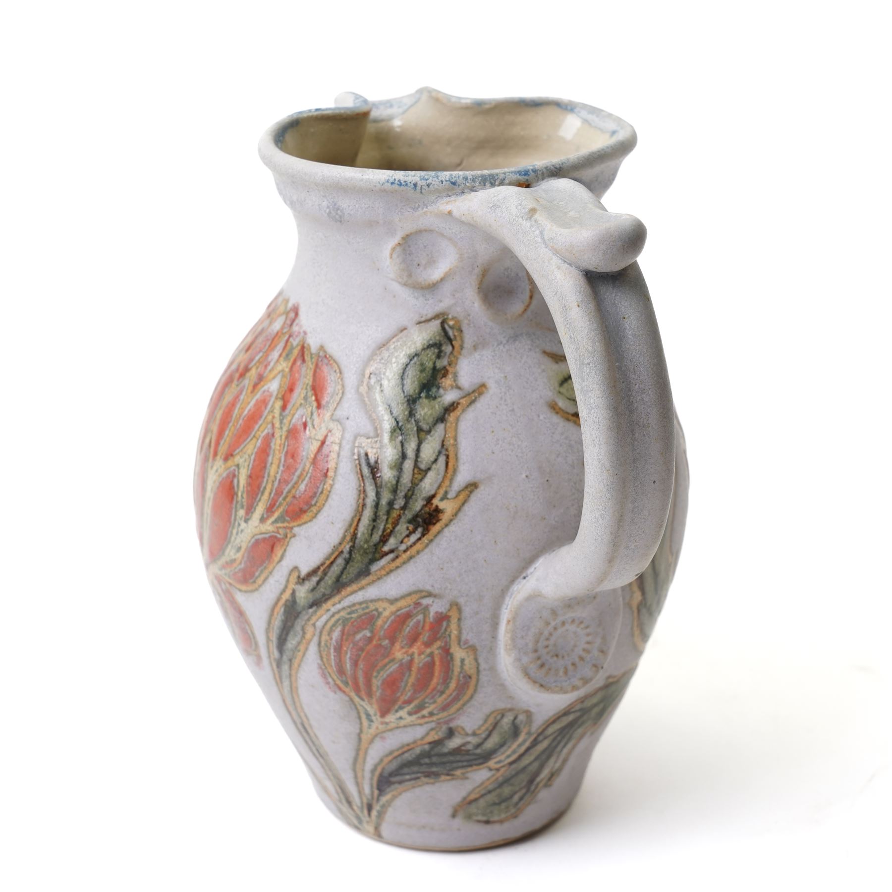 John Egerton (c1945-2024): studio pottery jug, decorated with artichoke on a blue ground, with mark beneath, H22cm 