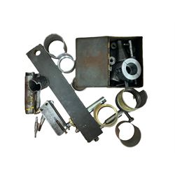 Clock mainspring winder, bench vice, assortment of clock pivot steel, Bergeron clock and watch bushes, watch keys, watchmakers screwdrivers, BA taps, letter punches and pin vices.