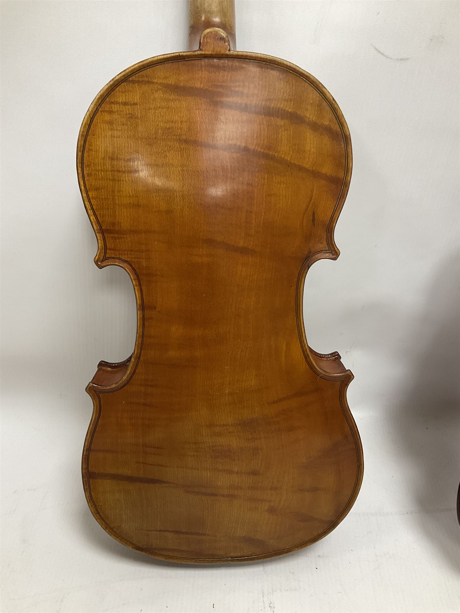 Four violins 1/8th size; half size with Nicolas Bertholini label; three-quarter size with Stradivarius copy label; and full size with Marquis De L'Air label (4)