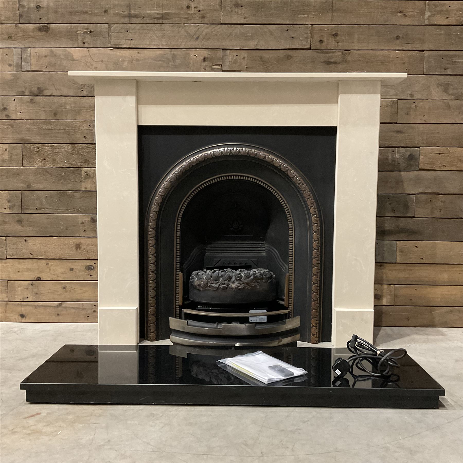 Aurora Dorchester Black Fire suite - granite style surround with cast iron insert, electric fire with remote and black hearth