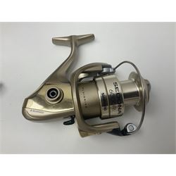 Four fixed spool reels, all in original boxes, comprising Shimano Ultegra 5500 XSD, with spare spool, Mitchell Autosurf 700, with spare spool, Shimano Sedona 600 FB with spare spool and D.A.M Quick 5001