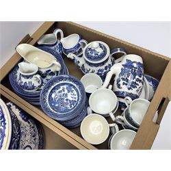 Large group of assorted blue and white, mostly Churchill Willow pattern, to include dinner and tea wares, in three boxes 