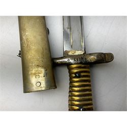 French Model 1866 sabre bayonet with 57cm fullered steel curving blade; in steel scabbard L71cm overall; another Model 1866 sabre bayonet lacking scabbard; and British Pattern 1856 sword bayonet (no scabbard) (3)