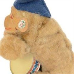 Two West German Urwald-Musik clockwork monkeys, one playing cymbals and the other a drum