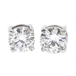  Pair of 18ct gold round brilliant cut diamond stud earrings, diamond total weight approx 1.35 carat  