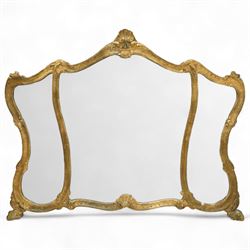 Gilt-framed neo-classical style tripartite overmantel mirror, arched top, scallop shell de...