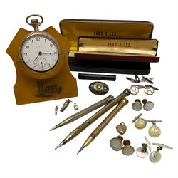 Early 20th century gold-plated pocket watch by Elgin, No. 13987130, screw back case with foliate decoration, white enamel dial with Arabic numerals, with stand, silver pencil by Johnson, Matthey & Co, London 1960, two other pencils, silver Egyptian mummy charm, stamped 800 and vintage and later cufflinks, shirt studs etc