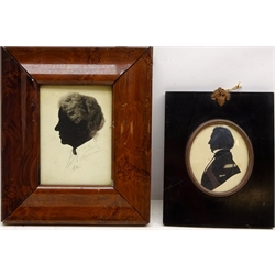  Silhouette Portrait of Gentleman, oval 19th century painted on paper 8.5cm x 7cm and Portrait of a Lady, silhouette signed Leigh 12.5cm x 9cm (2)  