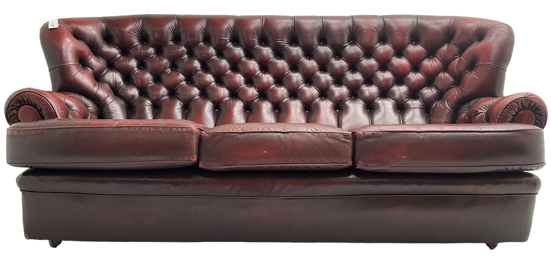 Wade - Georgian design three-seat sofa, high curved back over scrolled arms, upholstered in deep buttoned oxblood 'Pegasus' leather, on castors