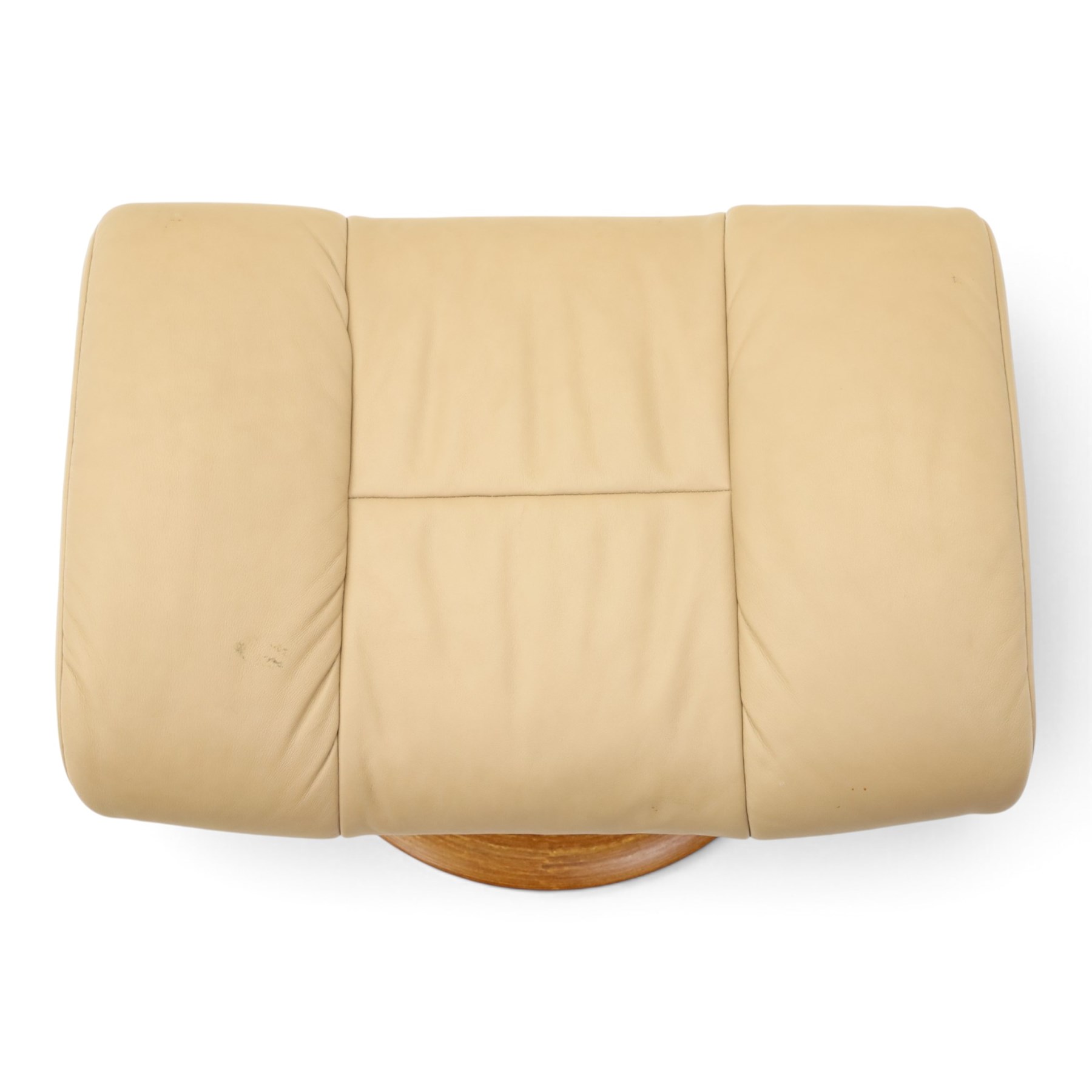Ekornes Stressless - beech framed reclining swivel armchair with matching footstool, on U-shaped supports with circular bases, upholstered in beige leather