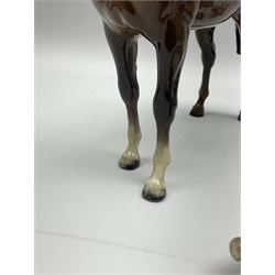 A collection of Beswick figures, comprising  Donkey model no 2267a, Donkey foal model no 2110, brown gloss foal model no 997, brown gloss horse model no 1992, palomino foal model no 763 (3rd version), and palomino horse model no 1265.  