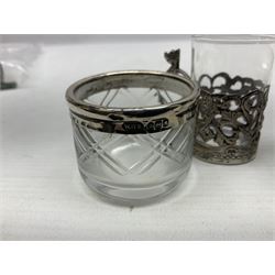 Miniature silver trumpet vase and cup holder, silver mounted glass scent bottle, pair of silver mounted open salts and a silver butter knife with hardstone handle, all stamped or hallmarked 