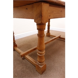  Rectangular country kitchen style pine dining table, turned supports joined by single stretcher, W150cm, H76cm, D87cm  