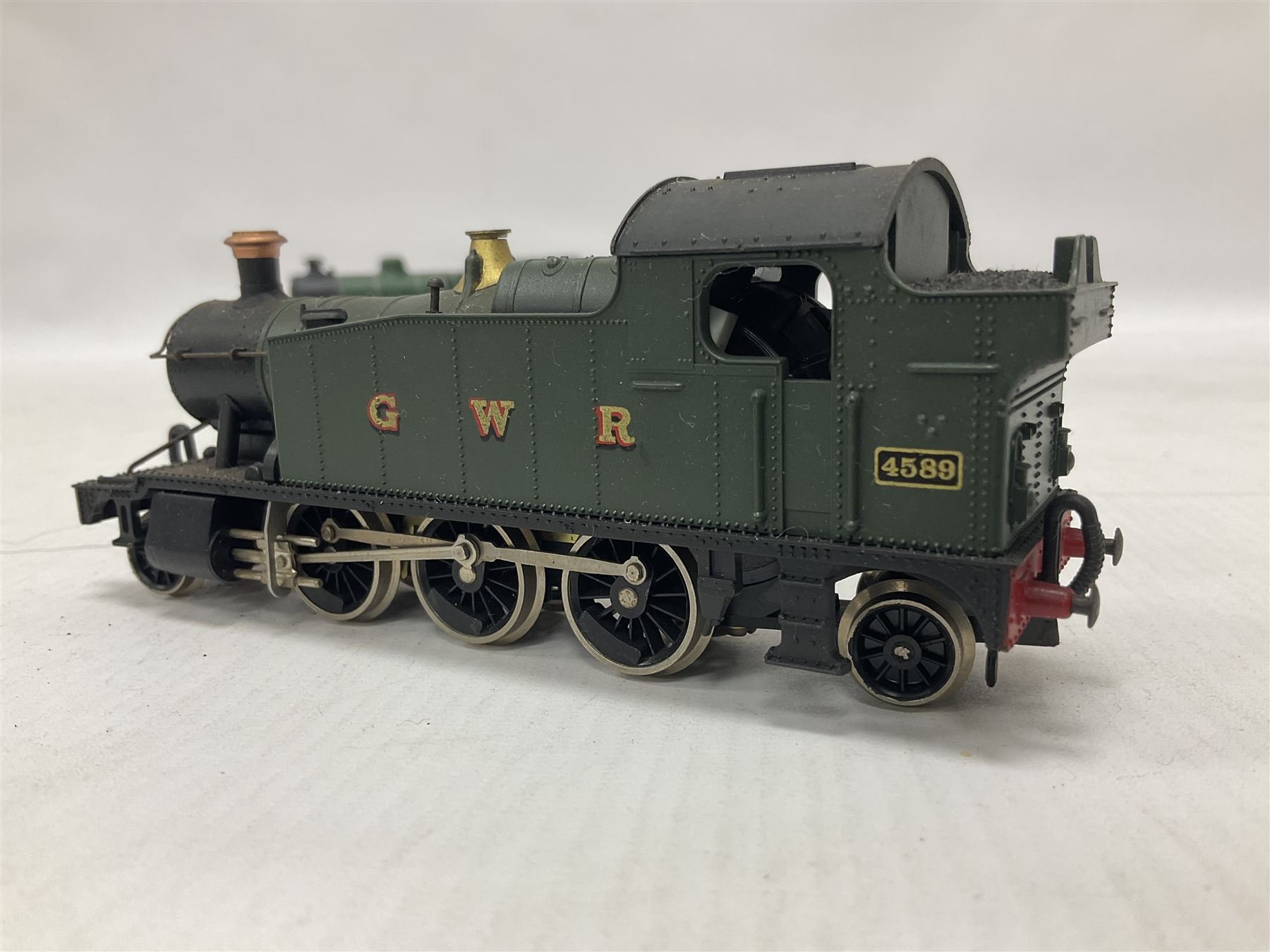 ‘00’ gauge - three kit built locomotives comprising Class J83 0-6-0T no.8477 finished in LNER green; GWR Class 4575 2-6-2T no.4589 finished in GWR green; GCR Class 9N/A5 4-6-2T no.169 finished in GCR green (3) 