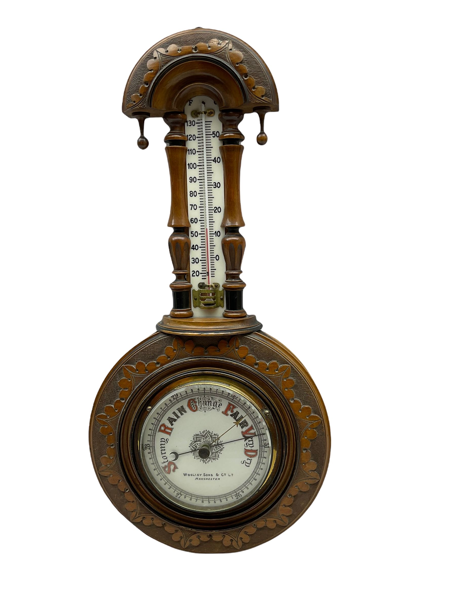An Edwardian hall barometer with a compensated Aneroid movement by the German maker Julius
