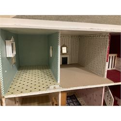 Modern scratch-built Palladian style wooden dolls  house as a 19th century double fronted two-storey property with simulated brick and stone walls under a removable simulated slate hipped roof; the triple hinged front elevation opening to reveal six rooms with central hall, stairs and landing L94cm H56cm D40cm