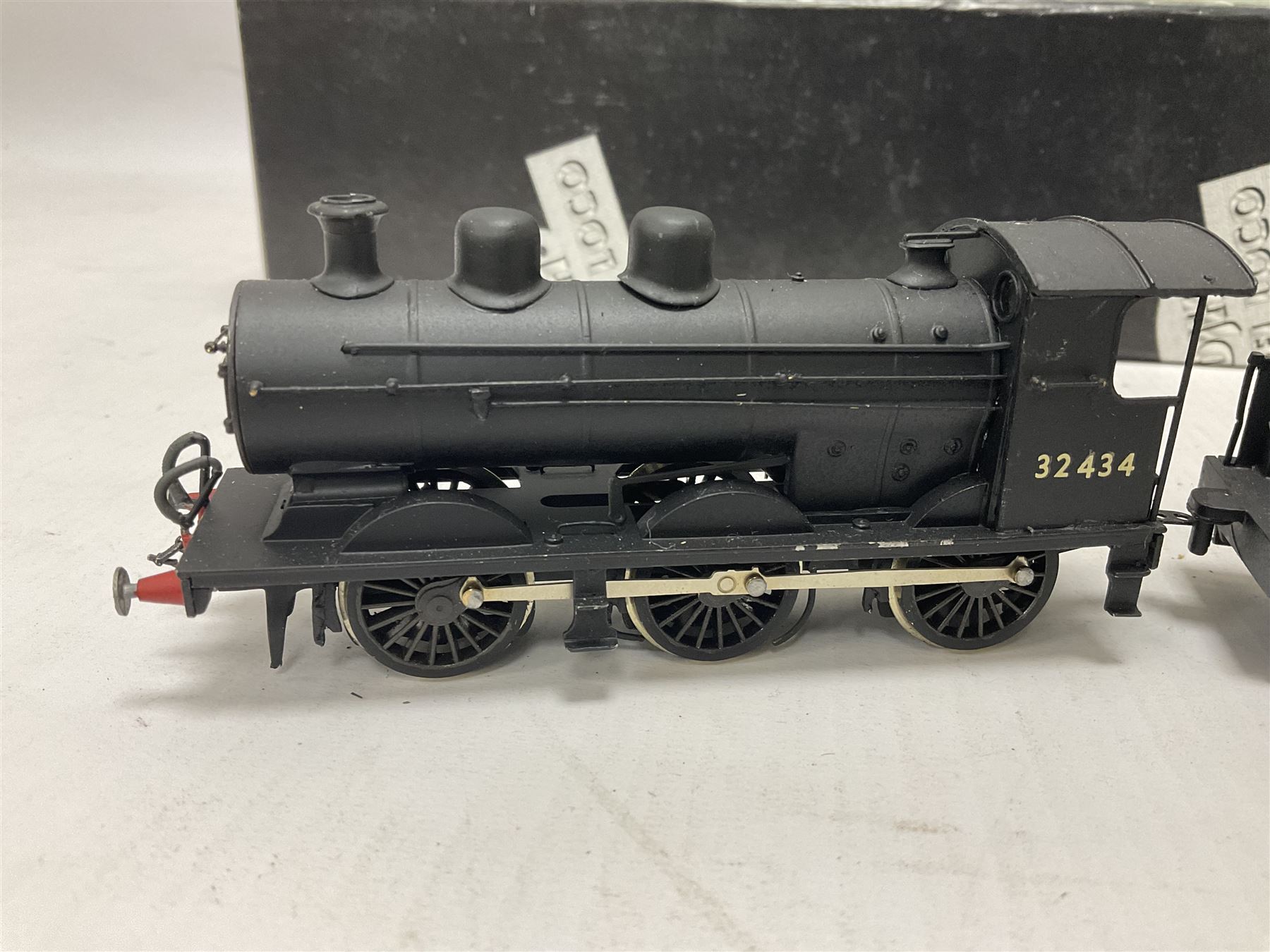 ‘00’ gauge - two kit built steam locomotive and tenders comprising Class 0395 Jumbos 0-6-0 no.30566 finished in BR black; Class C2X Large Vulcans 0-6-0 no.32434 finished in BR black; both with DJH Models boxes (2) 