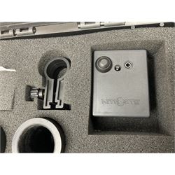 Two Nite-Site add-on kits in hard plastic carrying cases; one with charger