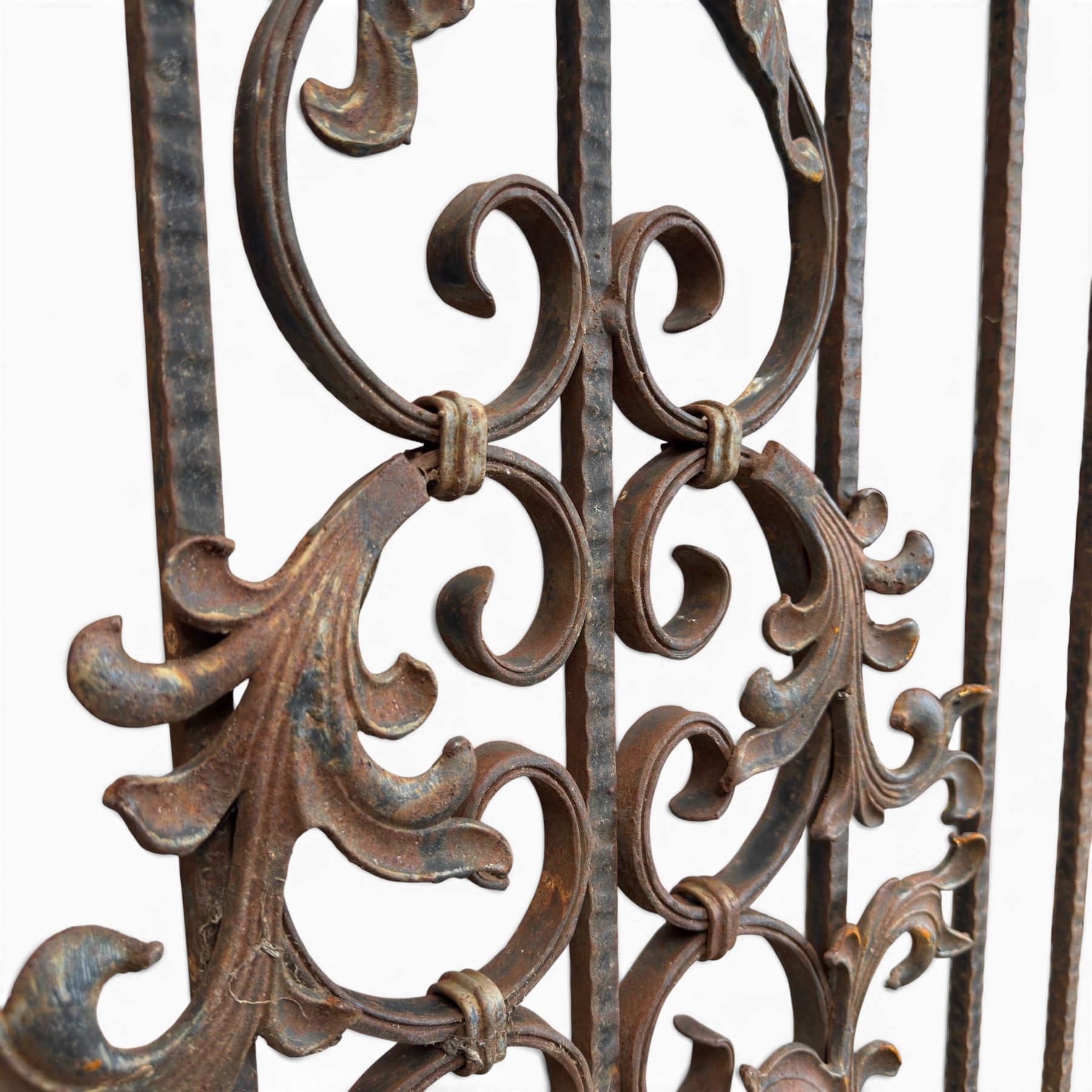 Victorian wrought iron vineyard gate, with ornate scrollwork and foliate acanthus leaf decoration, shaped cresting and central decorative panel, finished in rustic black painted finish