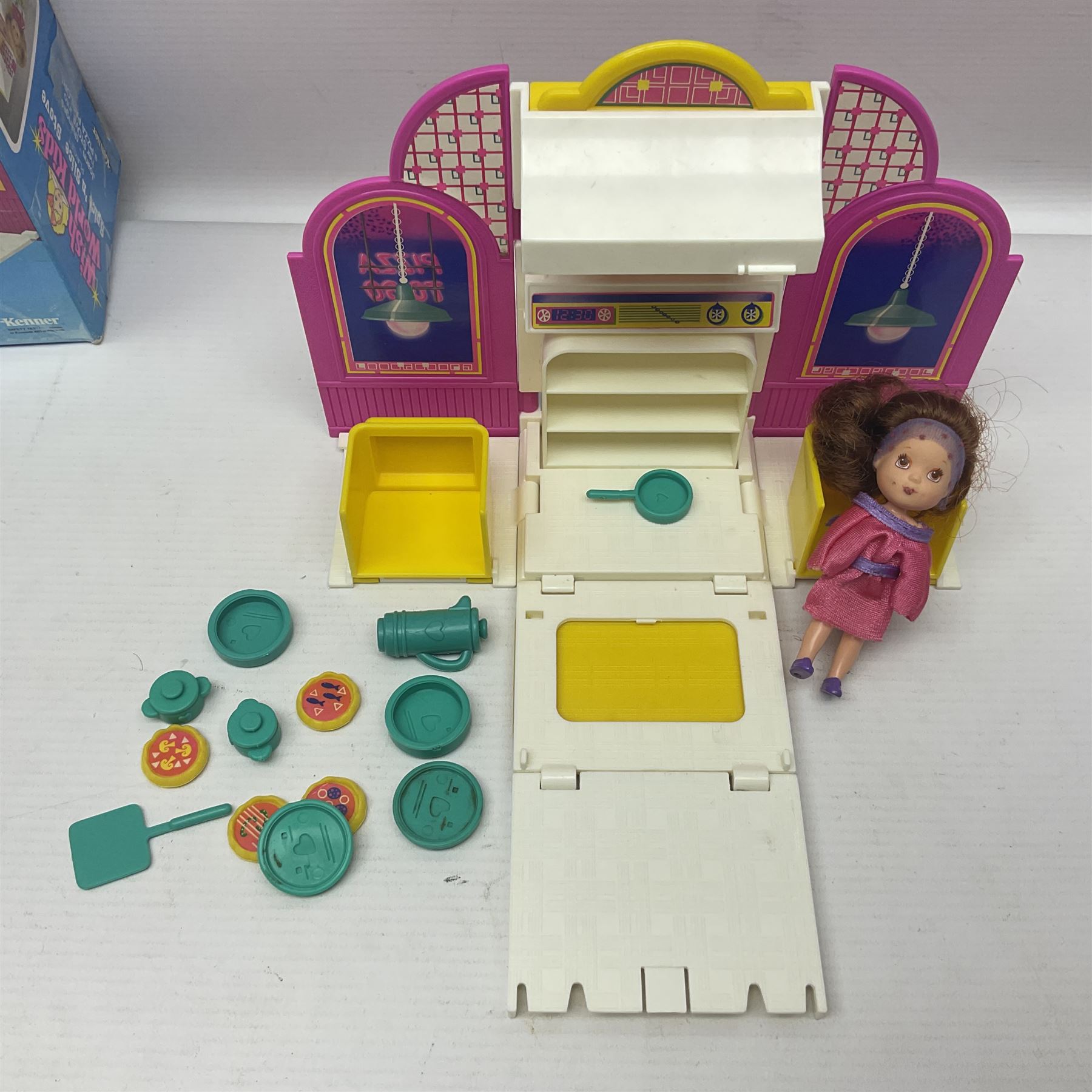 Wish World Kids - Eleven play sets comprising Treats ‘n Sweets Refrigerator, Grin ‘n Win TV, Sponge ‘n Plunge Bathtub, Socks ‘n Locks Dresser, Spice ‘n Slice Stove, Sleep ‘n Leap Bed, File ‘n Smile Desk, Blaze ‘n Braise Fireplace, Hear ‘n Cheer playset in Sponge ‘n Plunge box, two Read ‘n Speed Chair playsets in one box