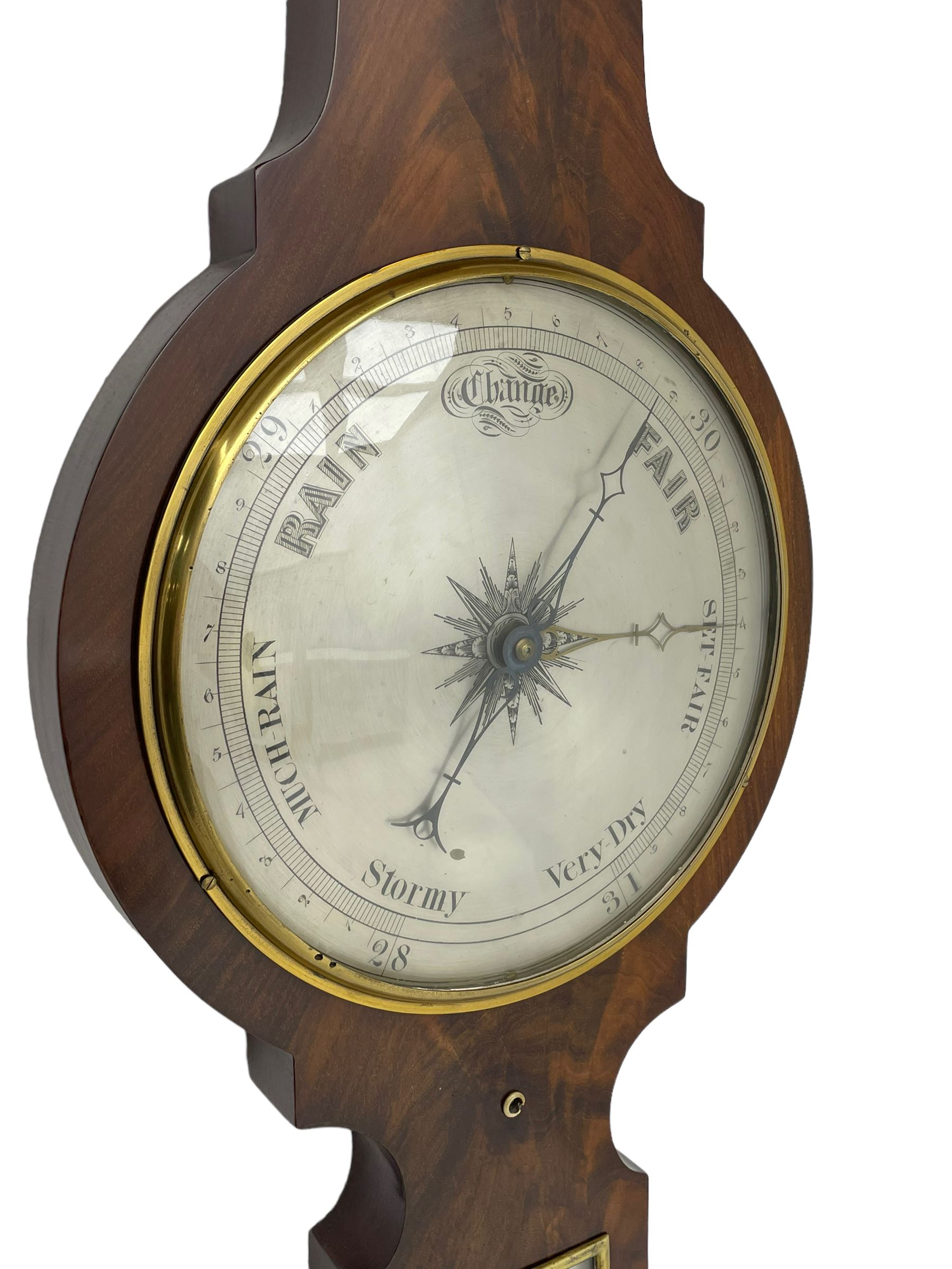 D Luvate of Preston - early Victorian mahogany mercury wheel barometer c1840, with a swan’s neck pediment and cavetto moulded square base, 8-inch silvered register calibrated in inches with a decorative star engraved centre, cast brass bezel and convex glass, with a steel indicating hand and brass recording hand, beneath a bowfronted Fahrenheit scale thermometer and hygrometer, rectangular spirit level signed D LUVATE, PRESTON.
Lacking recording hand button.
H109
Dominic Luvate is recorded as working as a barometer and looking glass maker in Friargate, Preston 1820-45
