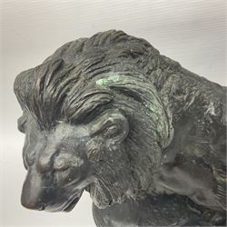 After Paul Edouard Delabrierre (French, 1829-1912), bronze, model of a lion, upon an oval base, signed E Delabrierre, overall H29.5cm, L46cm