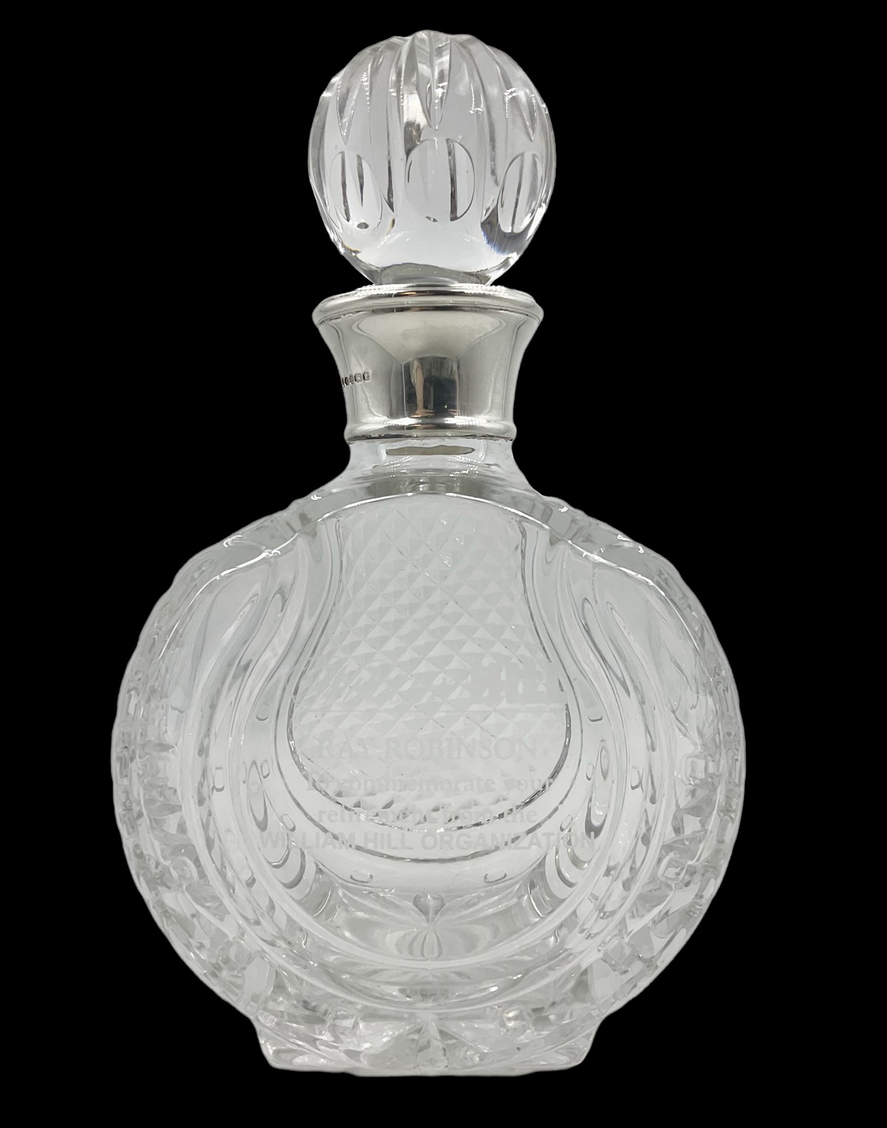 Modern silver mounted glass decanter, the cut glass body of circular form, with personal engraving, the silver collar hallmarked L J Millington, Birmingham 2008, overall H23.5cm