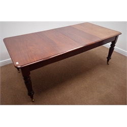  Victorian mahogany extending dining table, two leaves, moulded rectangular top on lobed tapering supports with brass sockets and castors, 204cm x 100cm, H76cm  