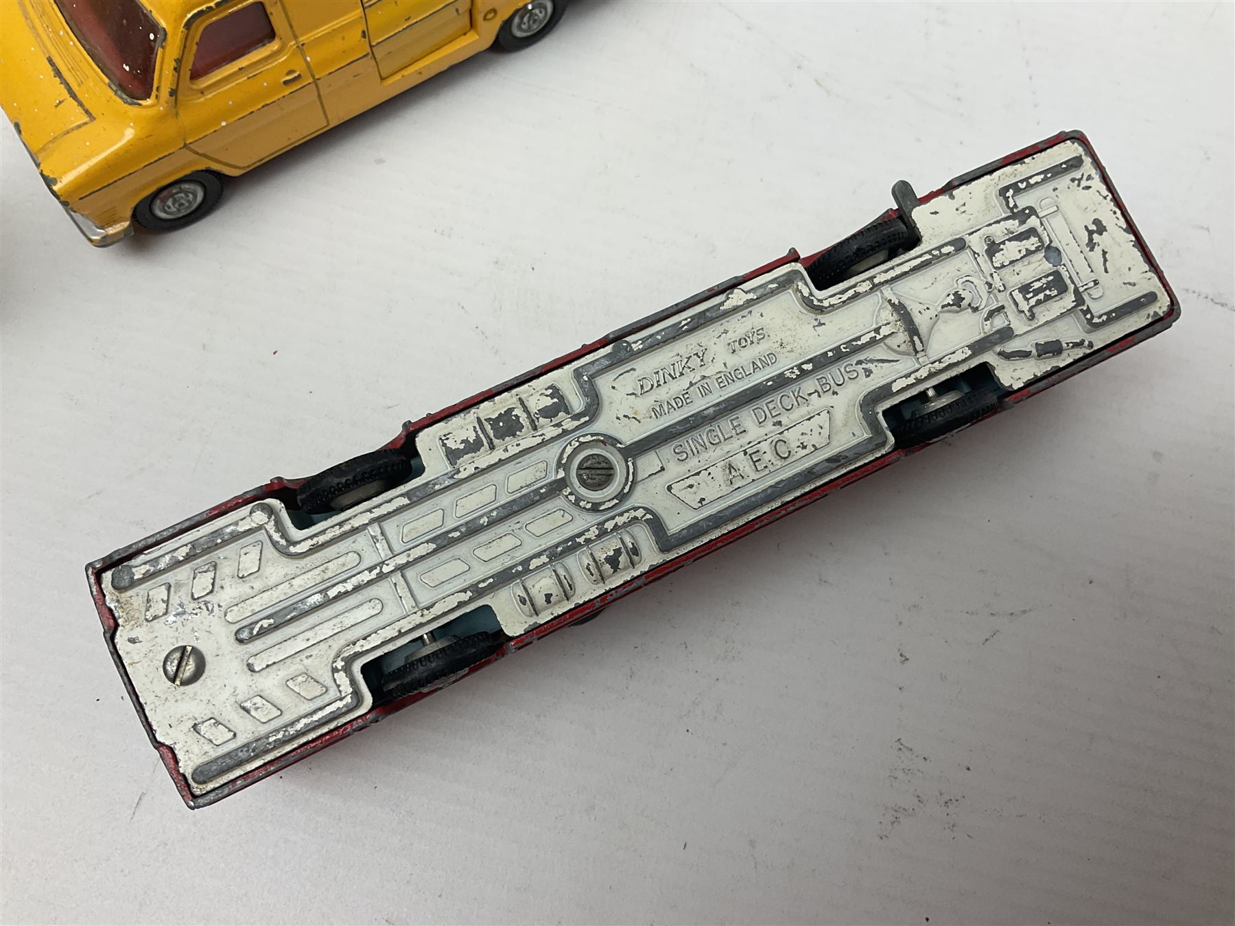 Dinky - sixteen unboxed and playworn die-cast models to include Single Deck Bus, two Atlantean Buses, Ford Transit Van, 10 Ton Army Truck, MGB Sports Car, Telephone Service Van etc 