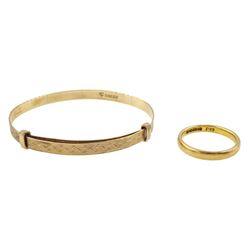 22ct gold wedding band, Birmingham 1932 and a 9ct gold child's bangle, both hallmarked