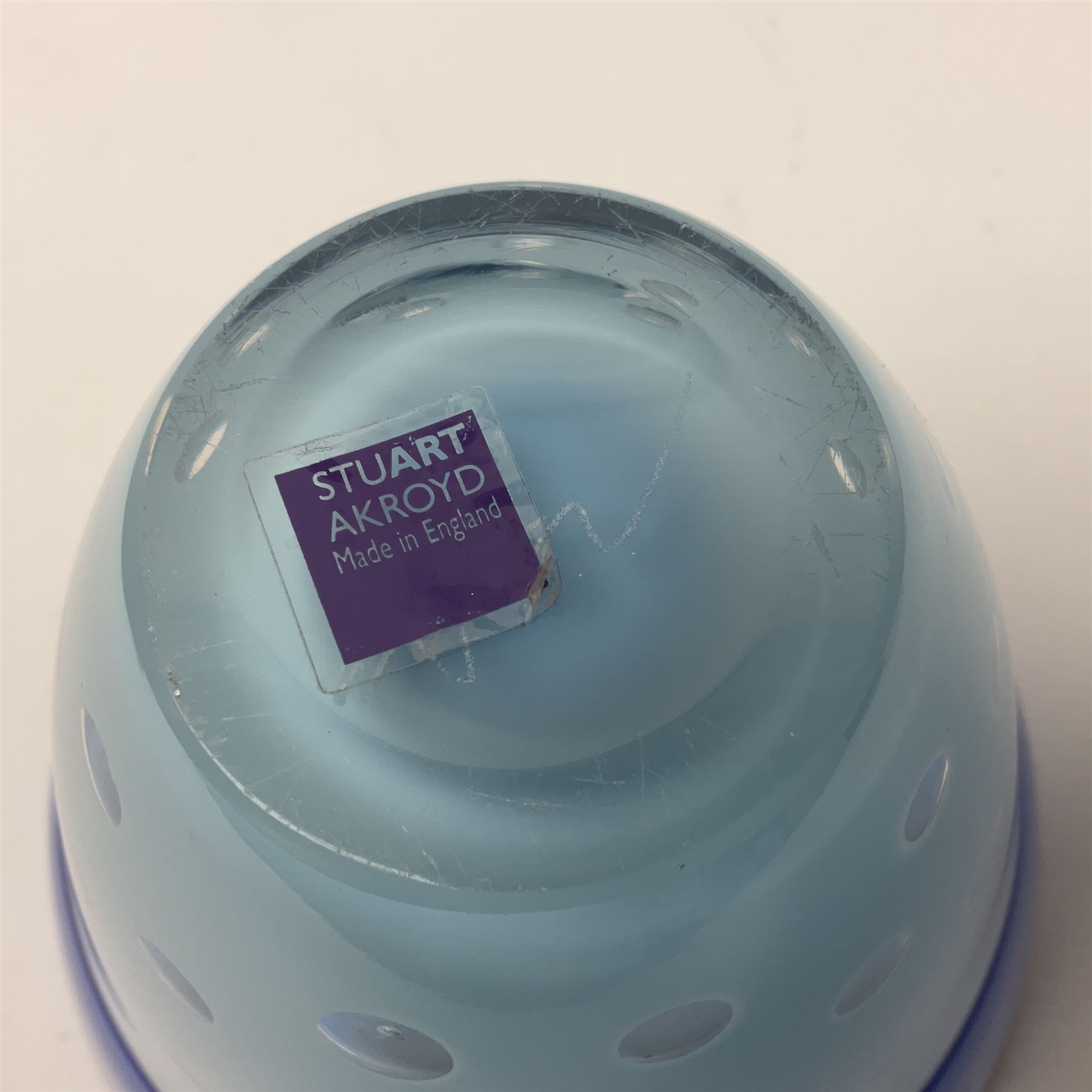 Stuart Akroyd Glass Vase, blue banded top and clear lower section with bubble inclusions, engraved signature and sticker beneath, H15cm
