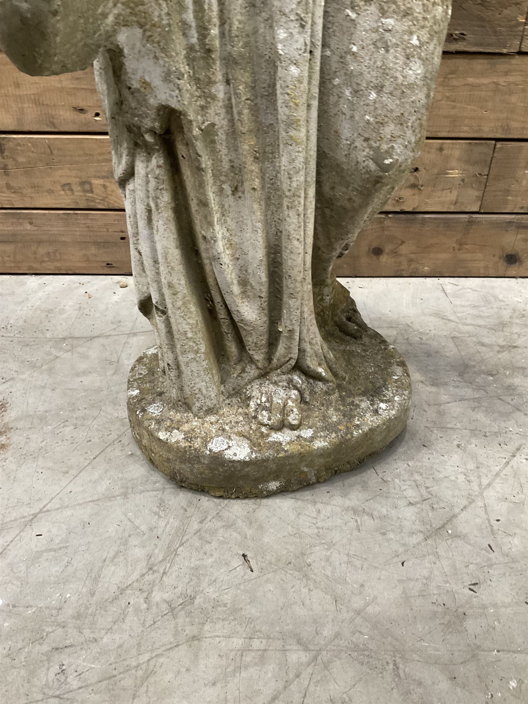 Pair of cast stone garden dogs and 2 female figures,