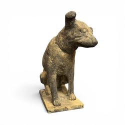 Cast stone garden statue in the form of a seated Jack Russell Terrier on a rectangular base