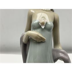 Three Lladro figures of ladies comprising 'The Flirt' model no 5789, 'Ingenue' model no 5487 and 'Carefree' model no 5790, all with boxes