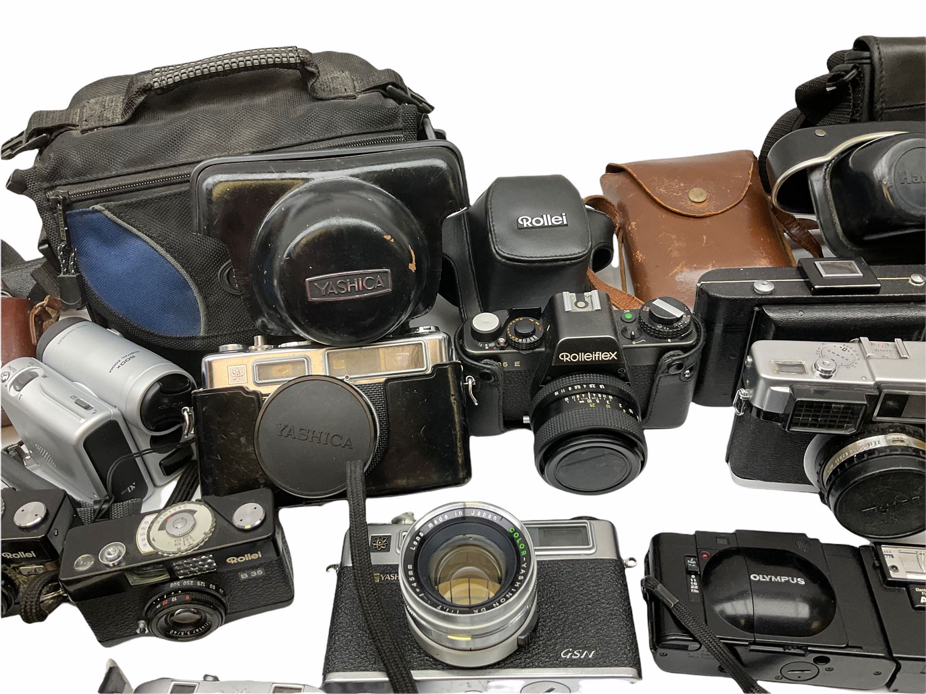 Collection of cameras, to include three Olympus Trip 35,  Balda Super Baldax, Seagull 4A TLR Camera, Pentax MG, Pentax-MV1, Yashica, two Yashica Electro 35, Rollei B35, Fujica 35 EE etc. 