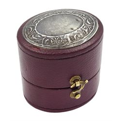 18ct white gold three stone oval ruby and round brilliant cut diamond ring, with diamond set shoulders, stamped, ruby approx 1.15 carat, total diamond weight approx 0.55 carat, in silver top ring box by The Victorian Ring Box Co, Edinburgh 1993 