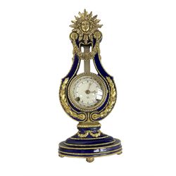 20th century V&A Marie Antionette lyre clock - Blue porcelain with gilt mounts on a  oval stepped base, dial with roman numerals and gilt hands, continental twin train spring driven movement sounding the hours and half hours on two bells. With key.
